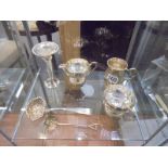 A mixed lot of silver plate including sugar bowl, milk jug, trinket box, ladles etc.