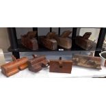 A selection of old wooden carpenters planes