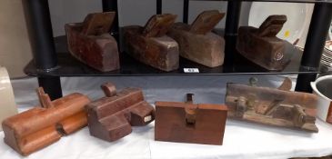 A selection of old wooden carpenters planes