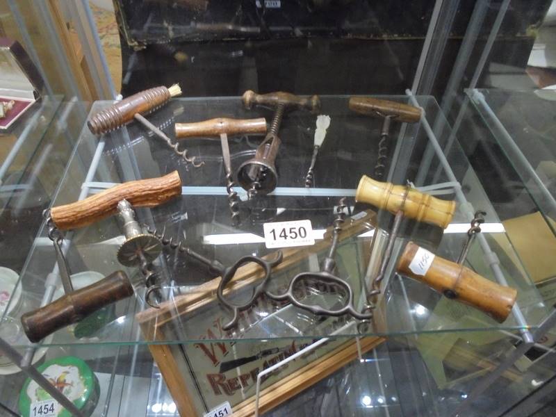 A quantity of vintage corkscrews.