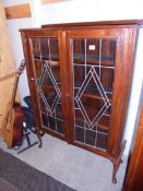 A two door lead glazed display cabinet, COLLECT ONLY.
