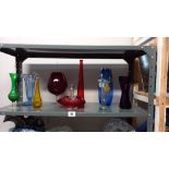 A selection of coloured glass vases etc