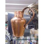 A large copper jug.