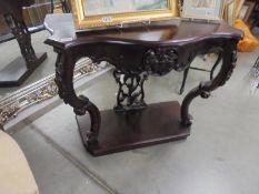 A mahogany console table. COLLECT ONLY.