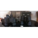 A pair of Prinzlux 12 x 50 and a pair of Prinz 10 x 50 binoculars with cases