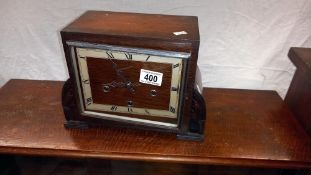 An art deco oak mantle clock