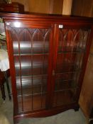 A mid 20th century mahogany display cabinet, COLLECT ONLY.