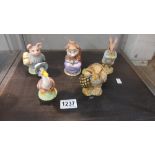 Five Royal albert Beatrix Potter figurines.