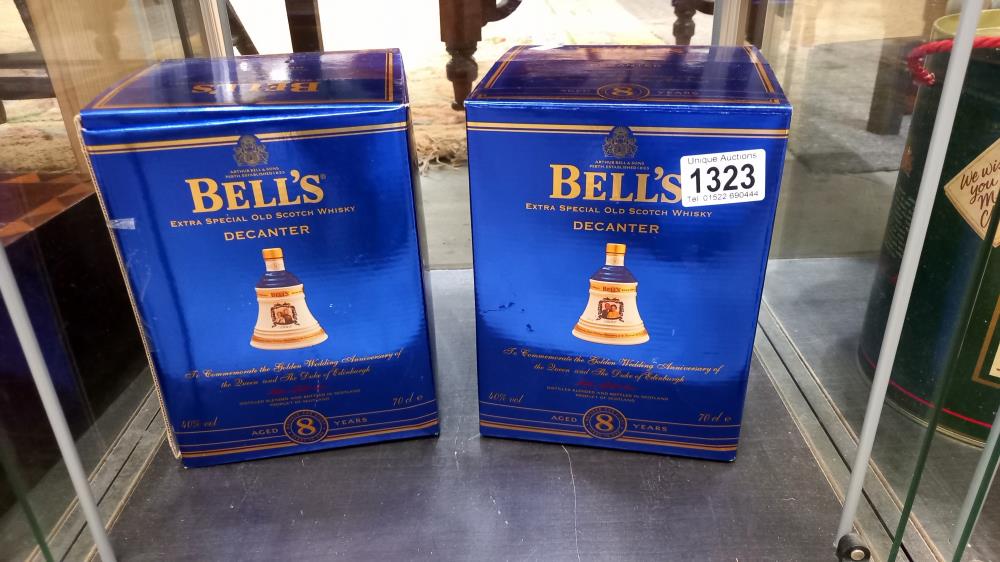 Two boxed Wade Bells whisky decanters - Queens Golden Wedding.