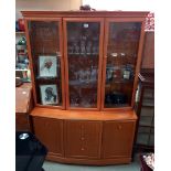 A golden oak wall unit with cut glass doors COLLECT ONLY