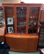 A golden oak wall unit with cut glass doors COLLECT ONLY