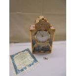 A Thomas Kinkade Lamplight Lane collector's clock.