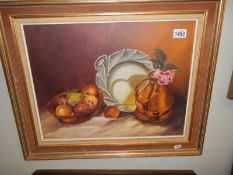 A mid 20th century oil on canvas still life painting signed Oliver Lawley, COLLECT ONLY.