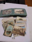 An album of postcards plus loose postcards including local interest.