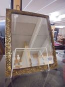 A gilt framed bevel edged mirror. COLLECT ONLY.