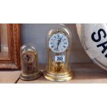 2 Anniversary clocks small one under plastic dome, large one under glass dome COLLECT ONLY