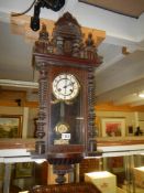 A Victorian wall clock in working order. COLLECT ONLY.