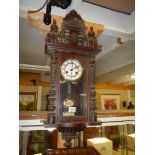 A Victorian wall clock in working order. COLLECT ONLY.