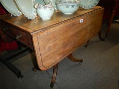 A mahogany Pembroke table on centre pedestal. COLLECT ONLY.