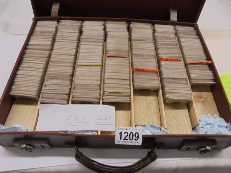 A case of 540 assorted coins including many silver examples.