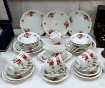 A vintage Chodziez rose pattern dinner service in the style of Old Country Rose COLLECT ONLY