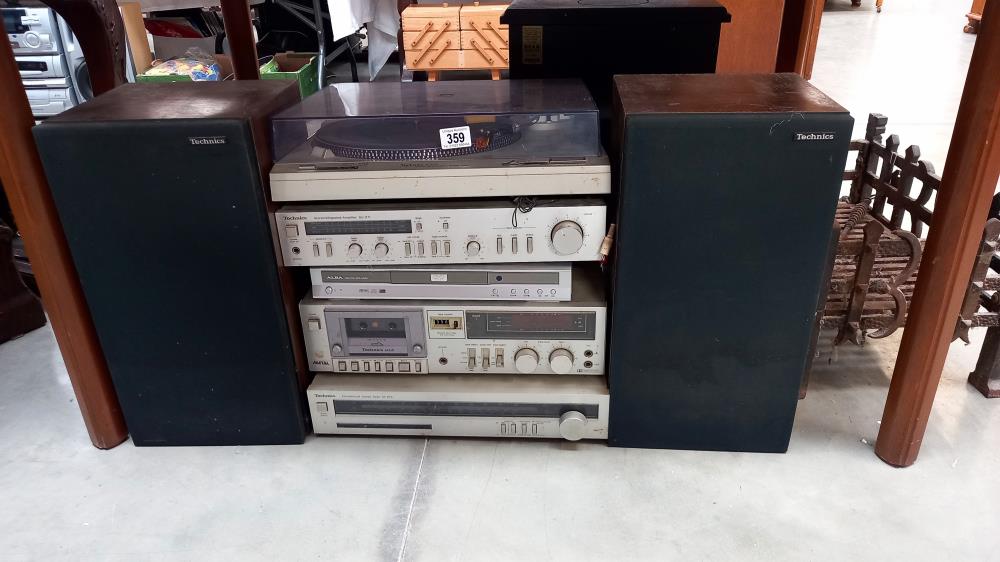 A Technics record deck, stereo tuner, amplifier & cassette player with speakers & Alba CD/DVD (