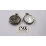 A silver full hunter pocket watch and another silver pocket watch.