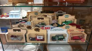 A large collection of approximately 40 boxed Lledo and days gone diecast models