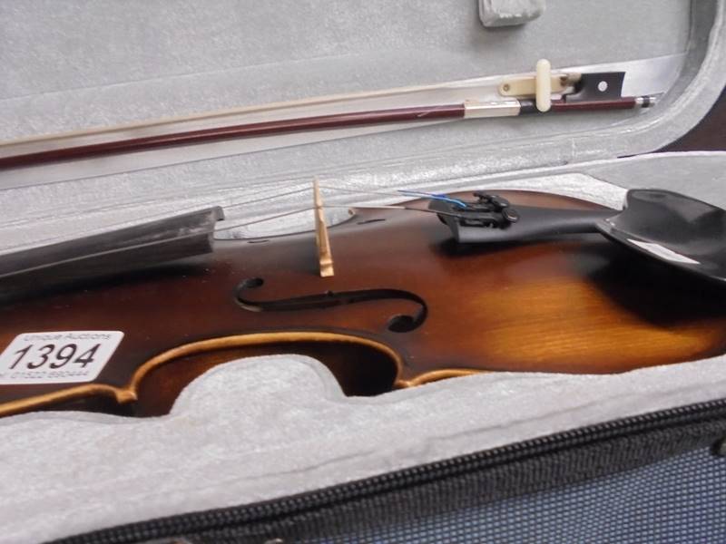 A cased violin with bow. - Image 2 of 2