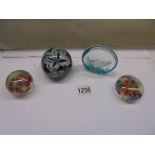 A Caithness limited edition 93/500 salmon paperweight, an Okra glass studios & 2 millifiori examples