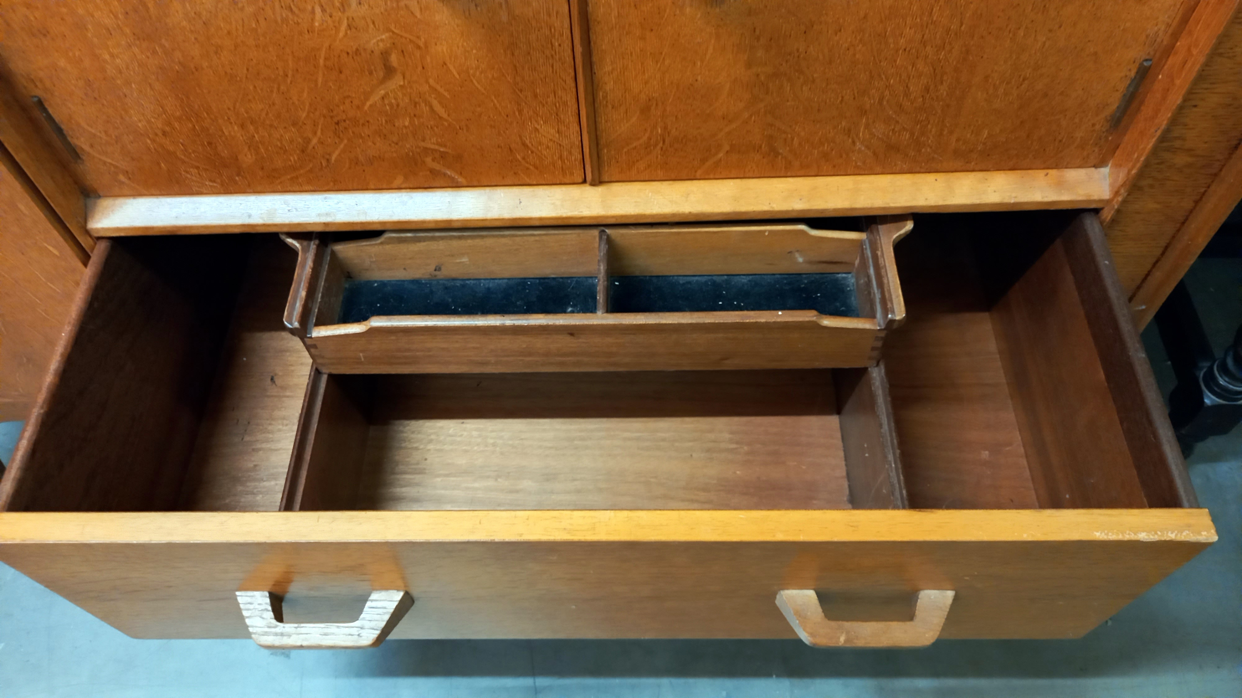 A 1950's light oak wall unit/sideboard with cupboard/drawer base with sliding cutlery tray & open - Image 4 of 4