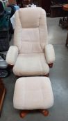 A reclining swivel chair with foot stool COLLECT ONLY