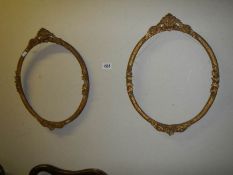 A pair of good oval picture frames.