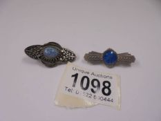 A vintage silver brooch with turquoise stone and a French antique Lourdes brooch/pin.