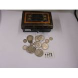 A quantity of silver coins, 13 grams pre 1920 and 110 grams 1921 - 1946.