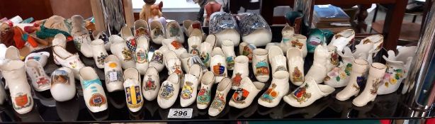 A large collection of crested china shoe ornaments etc