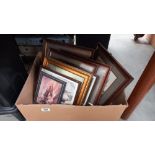A box of various sized picture frames with pictures COLLECT ONLY