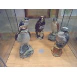 Five Beswick Gleneagles bird of prey decanters and a Royal Doulton example (some with contents).