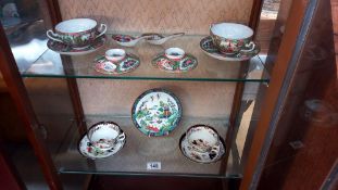 A Tiffany & Co plate, 2 Chinese famile rose soup bowls with spoons and lids and 2 cups and saucers