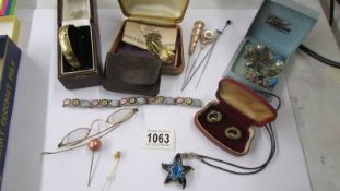 A mixed lot including micro mosaic bracelet, gold plated bangle, gold rimmed specs, hat pins etc.,