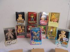 Eleven boxed Bad Taste Bears.