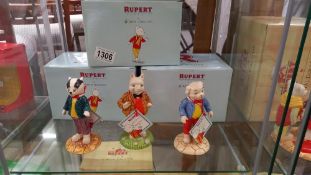 Three boxed Royal Doulton Rupert figures "Algy Pug", "Podgy Pig" and "Bill Badger"