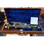 A cased G. M. Huller Germany bassoon