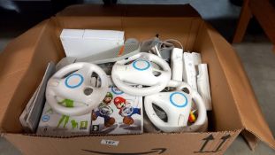 A Nintendo Wii, games and accessories