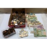 A mixed lot of coins and banknotes.