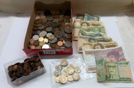 A mixed lot of coins and banknotes.