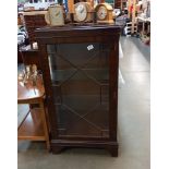 An Edwardian mahogany astragal glazed display cabinet