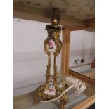A gilded bronze French ormolu and porcelain table lamp, 30 cm tall.