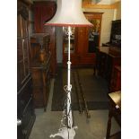 An Edwardian brass standard lamp (painted white) COLLECT ONLY.