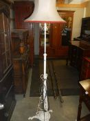 An Edwardian brass standard lamp (painted white) COLLECT ONLY.